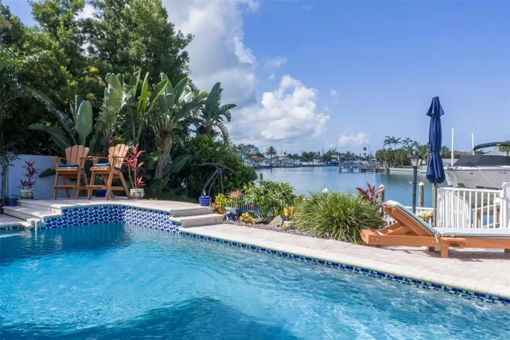 Lots of places to sit, relax and enjoy the sparkling pool and water view