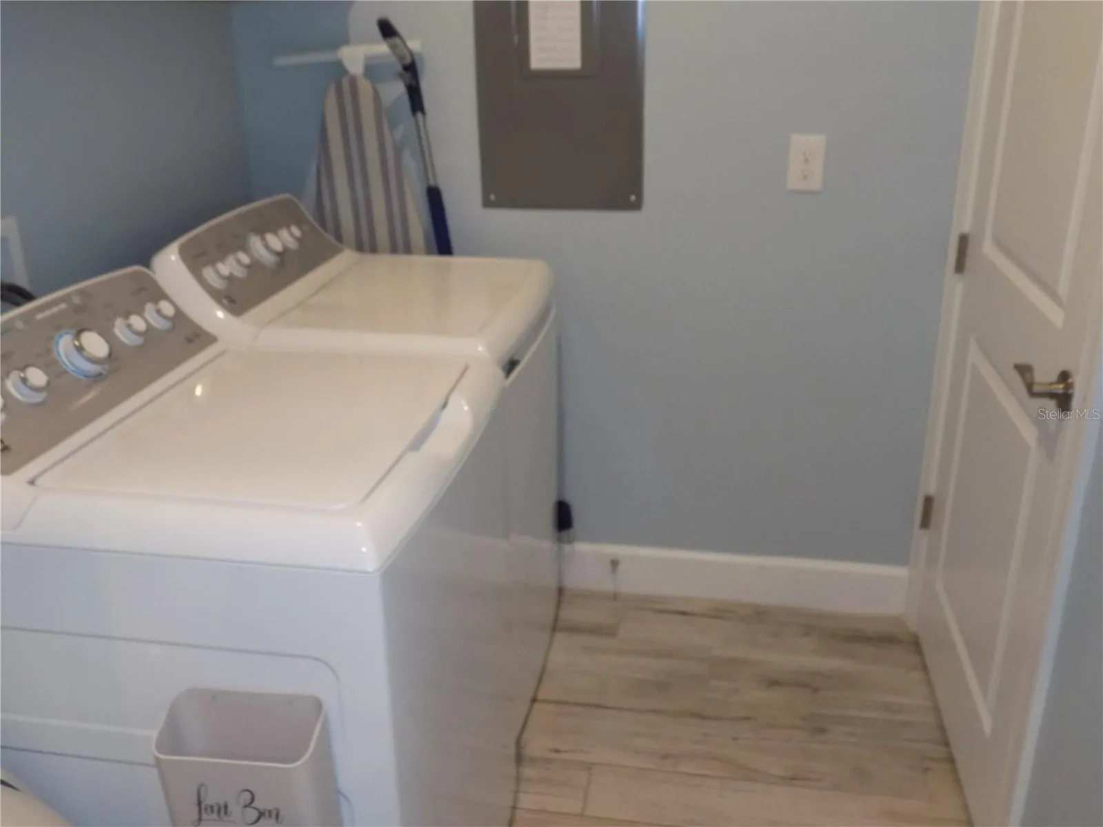 Inside laundry room with washer/dryer