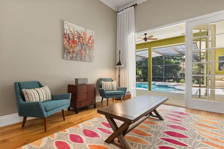 Nice relaxing space with access via french doors to the pool