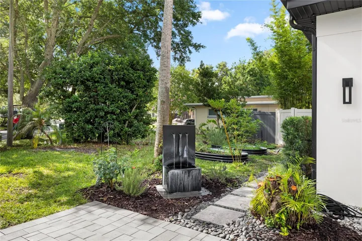 beautiful water feature invites you to your meditation path