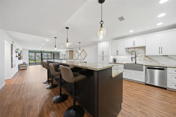 Enter from foyer to lavish custom kitchen.