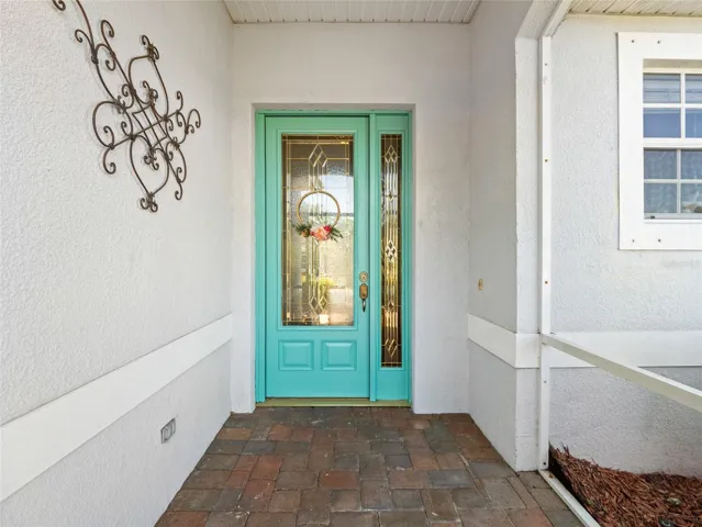 Charming façade with a welcoming covered front entrance