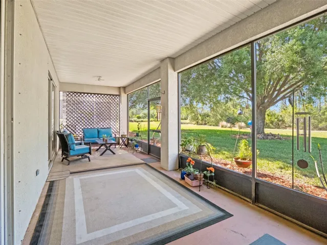 Spacious back porch ideal for outdoor seating and gatherings