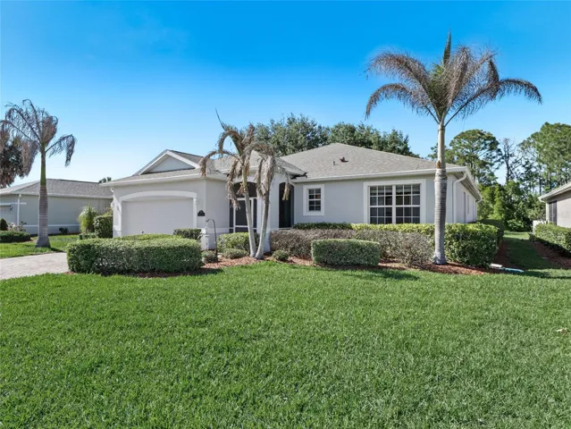 Inviting front exterior with attractive curb appeal and neat landscaping