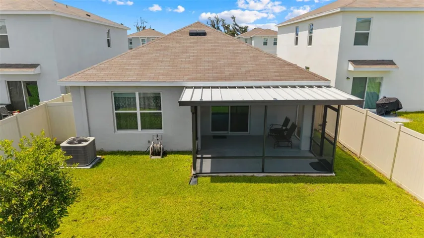 Extended patio, covered and screened in your fully fenced back yard.