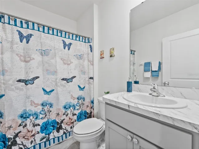 Full bathroom with tub