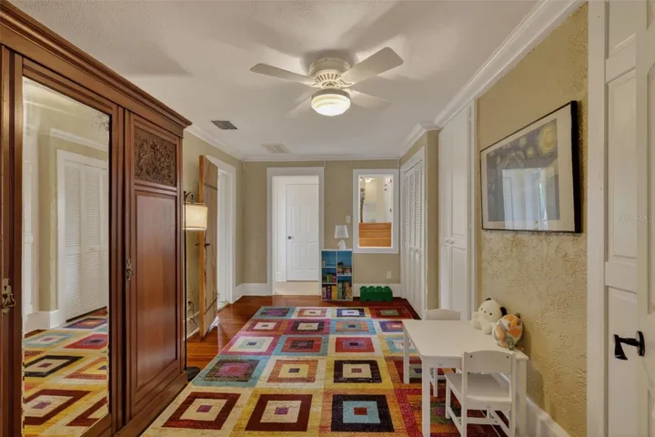 Playroom, outside of bedrooms 2 and 3. Second level entry to the apartment straight ahead