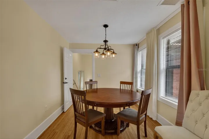 Dining room in apartment; door leads to second level of main home