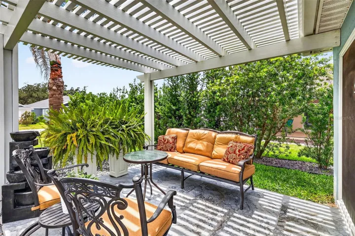 Side Patio with Waterfall and Pergola