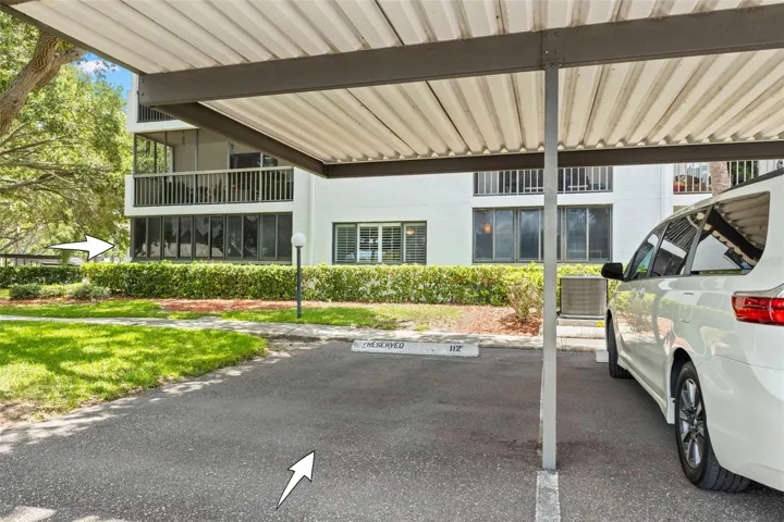 The assigned covered carport offers convenient parking and protection from the Florida sun and rain.