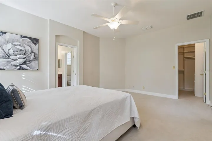 Primary Bedroom w/ a walk-in closet