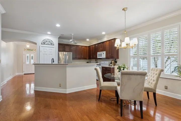 View of the Dinette, Kitchen & Foyer areas