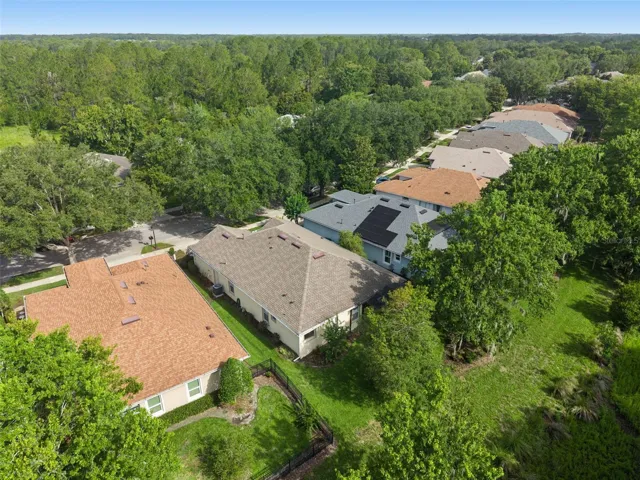 Aerial view of the surrounding neighborhood area by the home