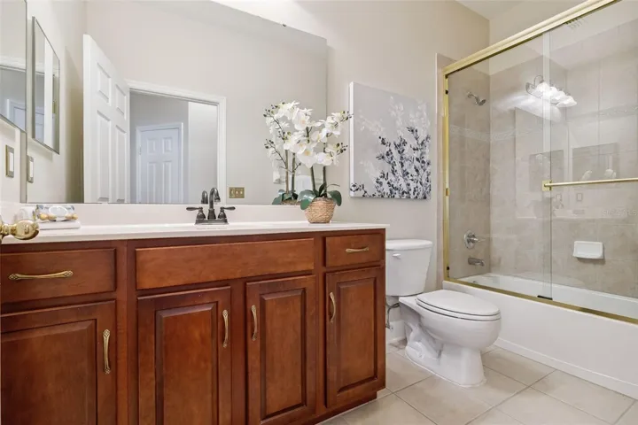 11' x 5' Guest Bathroom w/ a sliding glass enclosure for the tub/shower combo