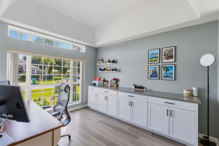 Being used as a front office but easily used as additional living room with built in storage!