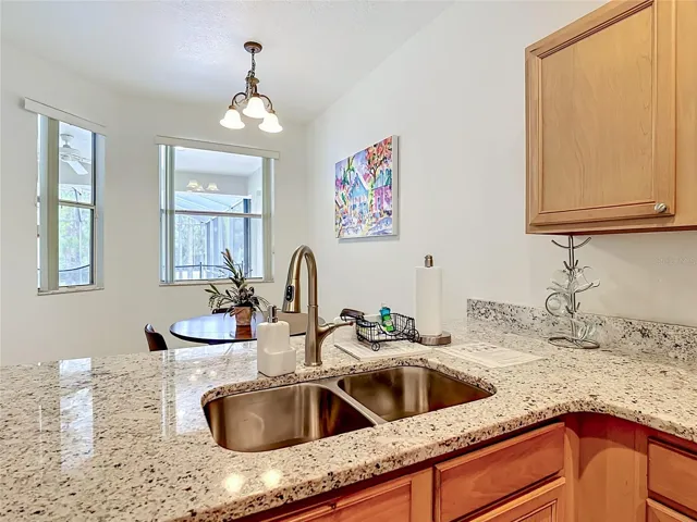 Updated Kitchen with Quartz Countertops and Stainless Appliances