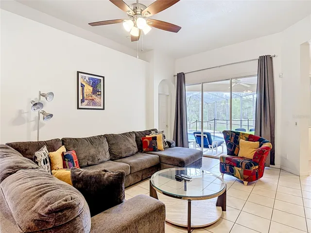 Living Room with Sliding Glass Doors to Pool Area