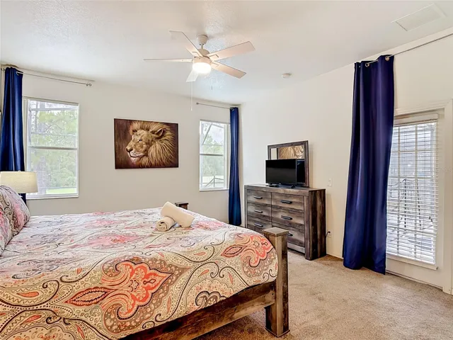 First Floor Primary Suite with Direct Pool Access