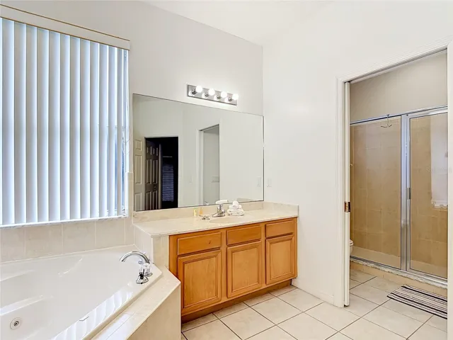 Primary Bathroom with Walk-In Closet Access