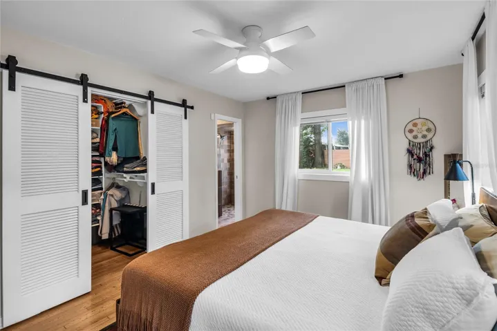 Primary bedroom with en suite bathroom and walk-in closet