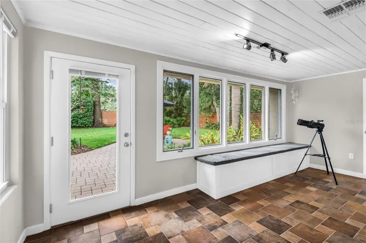 Sunroom leading to the beautiful backyard