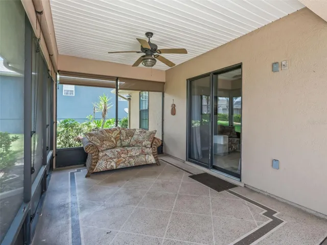 Screened Lanai w/Painted concrete floor & access to dining area