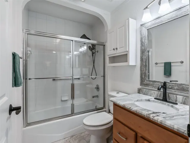 Guest bathroom w/Tiled Tub & Shower combination