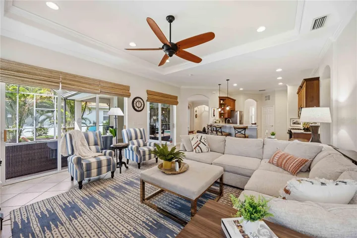 Bright living room with sliders to the lanai