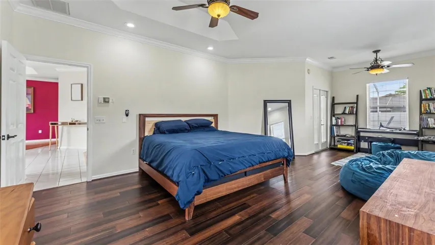 Primary Bedroom/Doors leading to Pool area