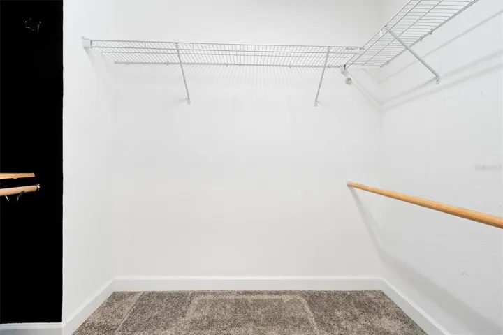Primary Suite Walking Closet 1