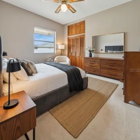 Virtually staged Bedroom #1 with new closet configuration.