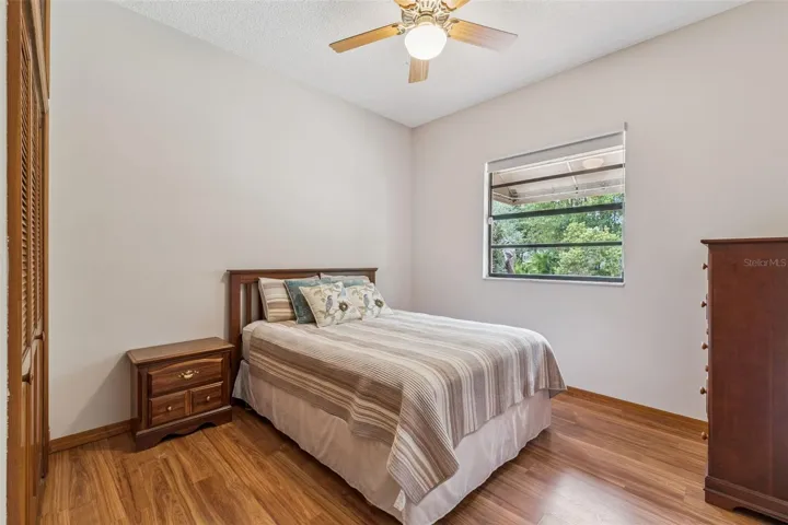 Beautiful Bedroom #2 with new laminate flooring.  Large closet.  Awning over window to keep it cool!