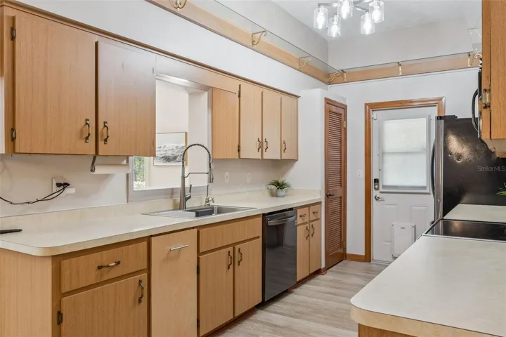 Nice-sized pantry in kitchen, newer appliances, LG Refrigerator