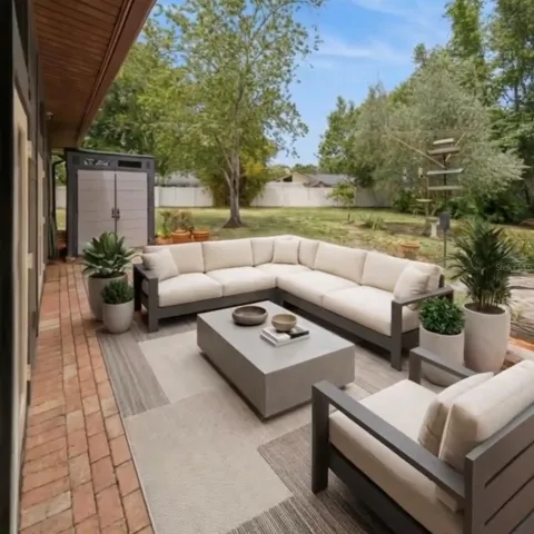 Virtually-staged with patio furniture.