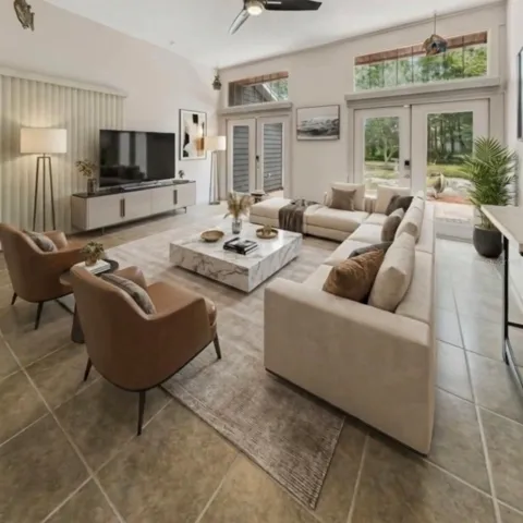 Virtually-staged bonus room.  It's all under A/C!!