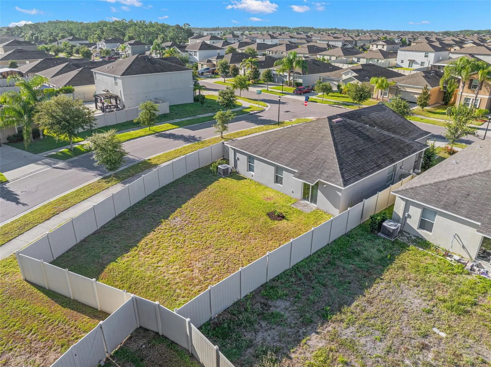 Enjoy a spacious, fully fenced backyard with ample room for outdoor activities, future landscaping, or a custom patio expansion.