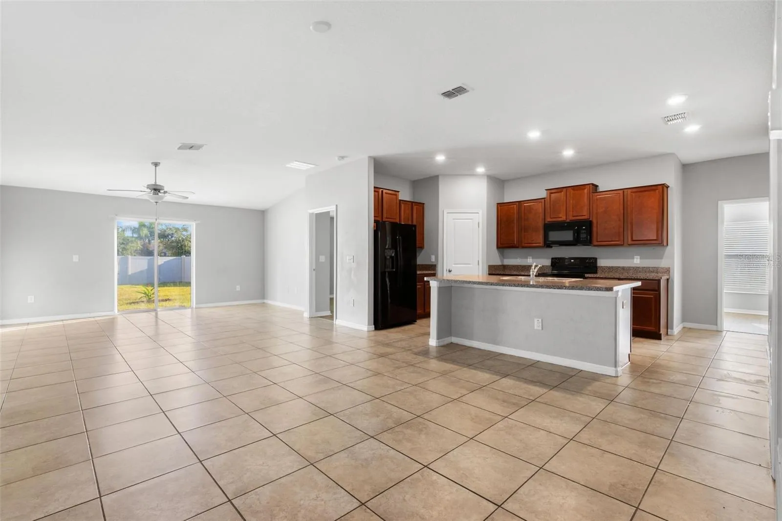 Virtually staged to illustrate the room’s generous proportions and potential furniture placement.