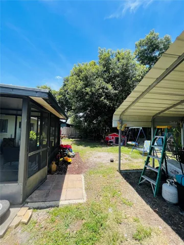 backyard screenporcg and metal canopy