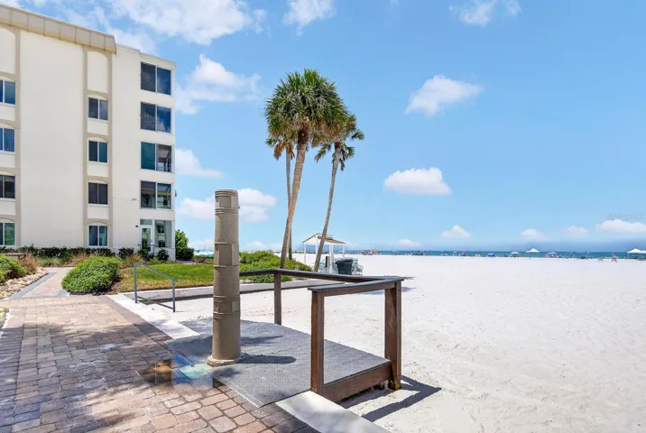Shower area to wash off sand by buildings