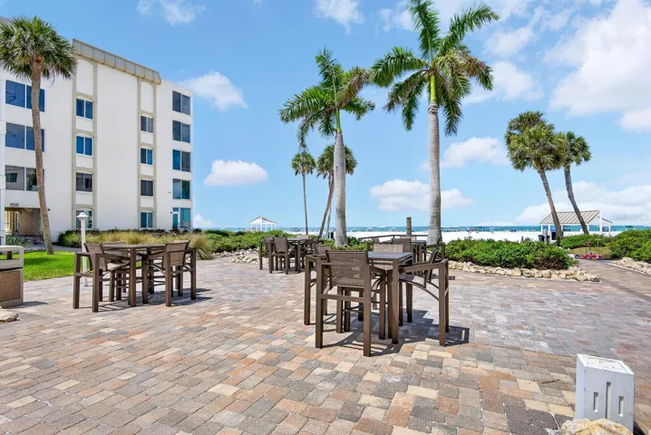 Tables by your building to meet friends and watch sunset