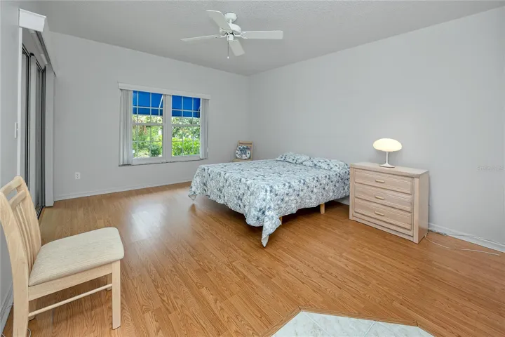 Primary Bedroom with lush views