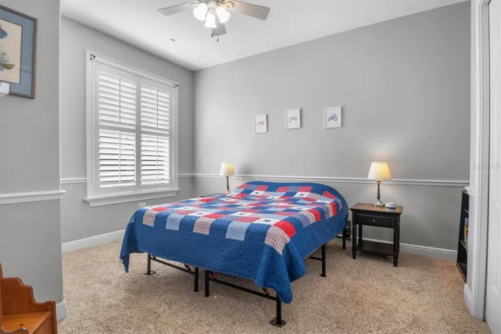 Bedroom 3 with built in closet, plantation shutters