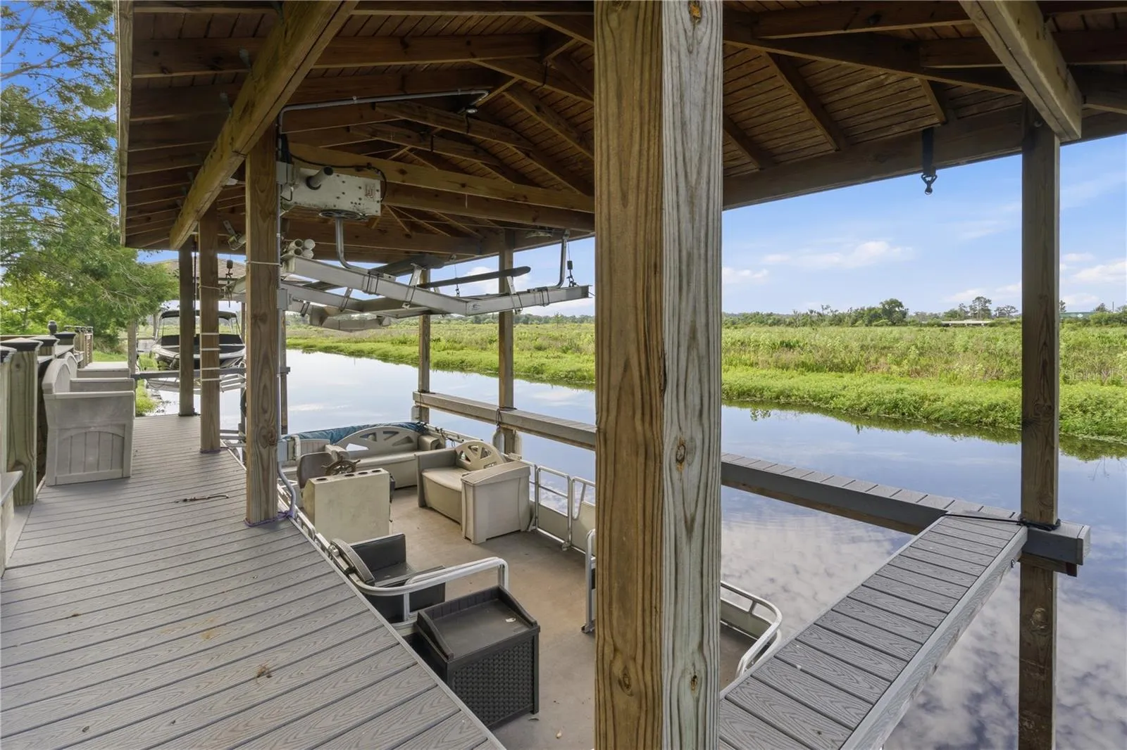 Private Boat lift with space for both a boat and a personal water craft.