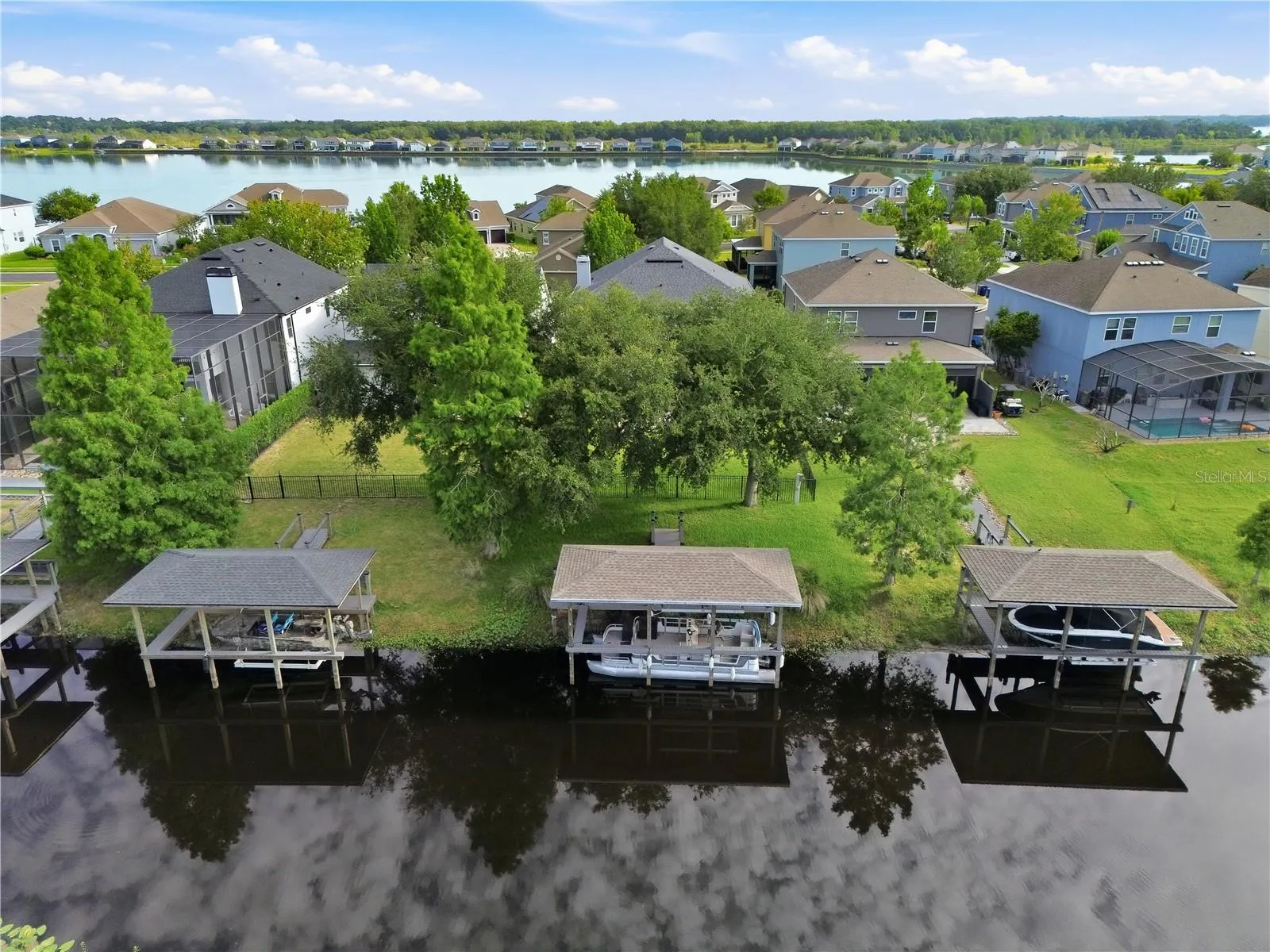 Private Boat lift with space for both a boat and a personal water craft.