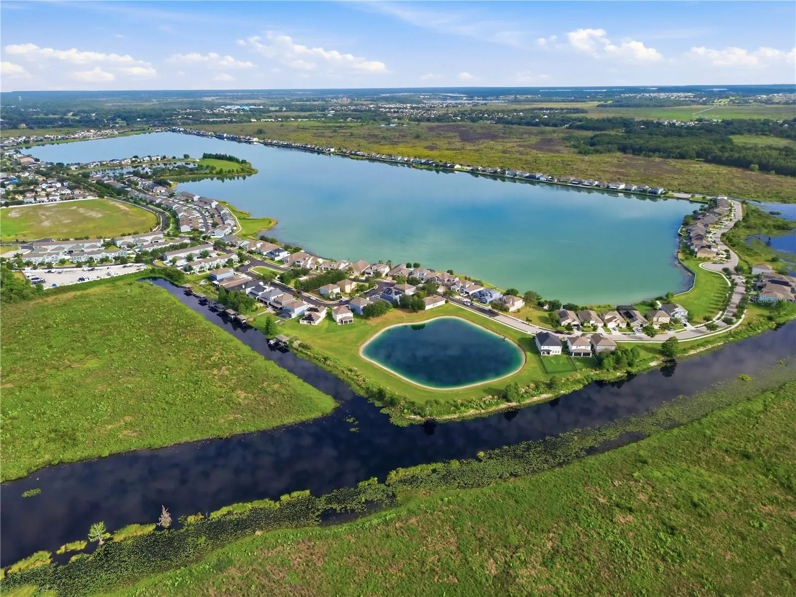 Aerial view rear canal with access to chain of lakes