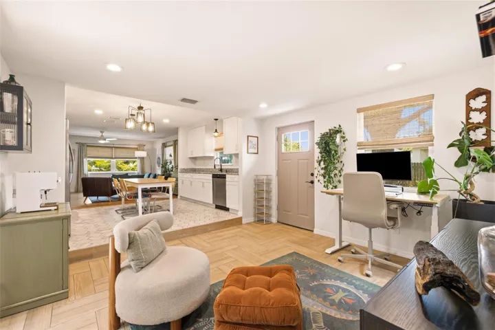 Flex Space - could be used as a dining room, office, play room, etc. Includes back/side door to the yard