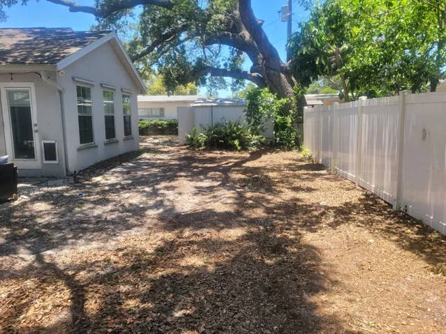 Private, fully fenced backyard with room for recreation and entertaining.