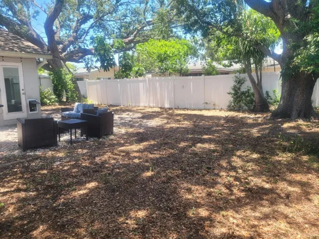 Private, fully fenced backyard with room for recreation and entertaining.