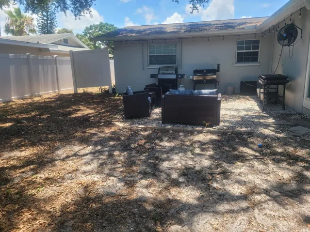 Private, fully fenced backyard with room for recreation and entertaining.