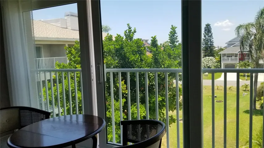 Master bedroom area features  All Seasons balcony overlooking pool and garden area